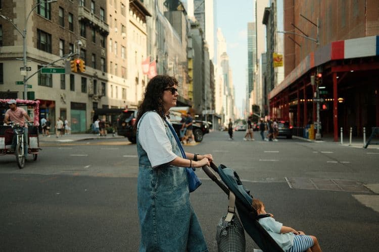 Mother with stroller in the city
