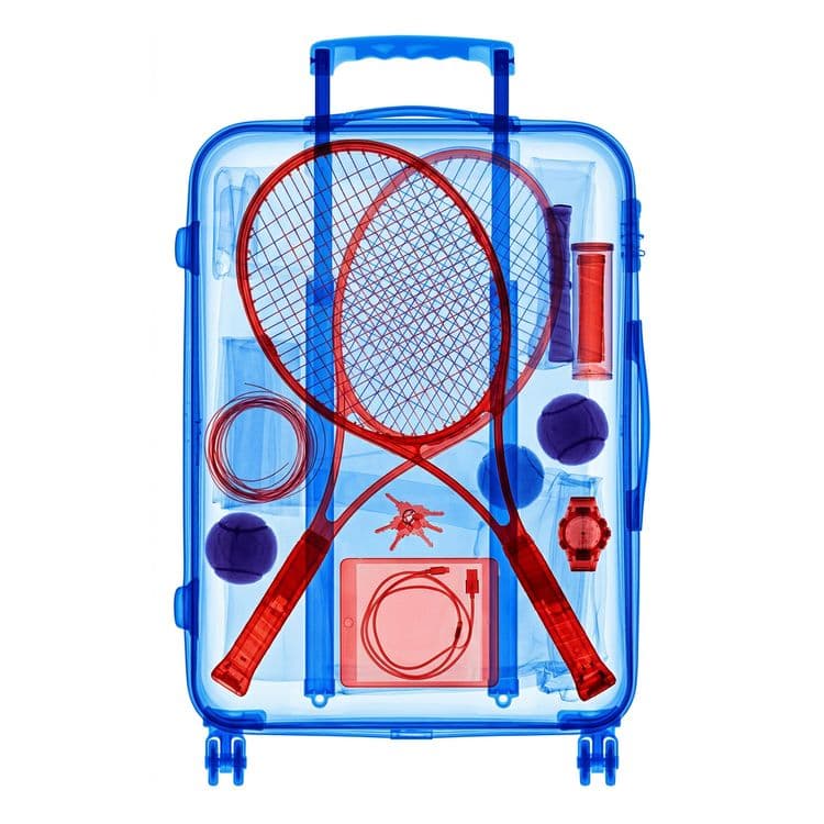 X-ray view of suitcase with tennis equipment