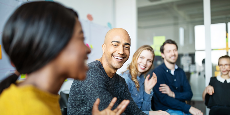 Business team smiling during a meeting